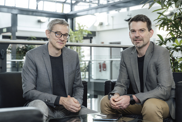 Picture of Prof. Dr. Bernt Schiele (left), head of the new research area "Vision and Language Models" and new co-director at the Saarbrücken Research Center for Visual Computing, Interaction and Artificial Intelligence (VIA) with Prof. Dr. Christian Theobalt (right) founding director of the VIA Center